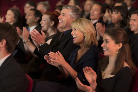 Clapping theater audience