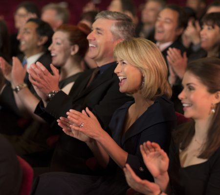 Clapping theater audience